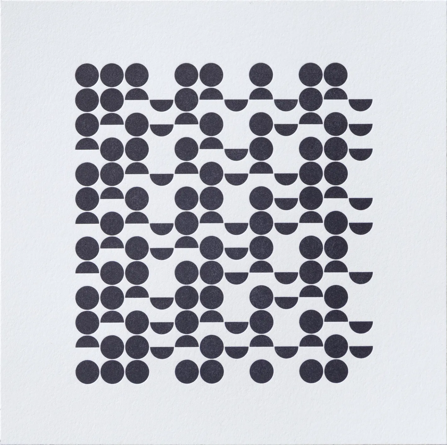 Square letterpress print. An even grid of circles and semicircles, nearly touching each other, is printed in dark gray ink. Some cells in this grid are occupied by a full circle, while others have only the top or the bottom half of a circle, and other cells are blank. Some columns of this grid have many full circles, while others have none, creating a pattern of uneven vertical bands. This pattern intersects with a more subtle pattern of diagonal bands, as if to be an abstraction of ripples overlapping on water.